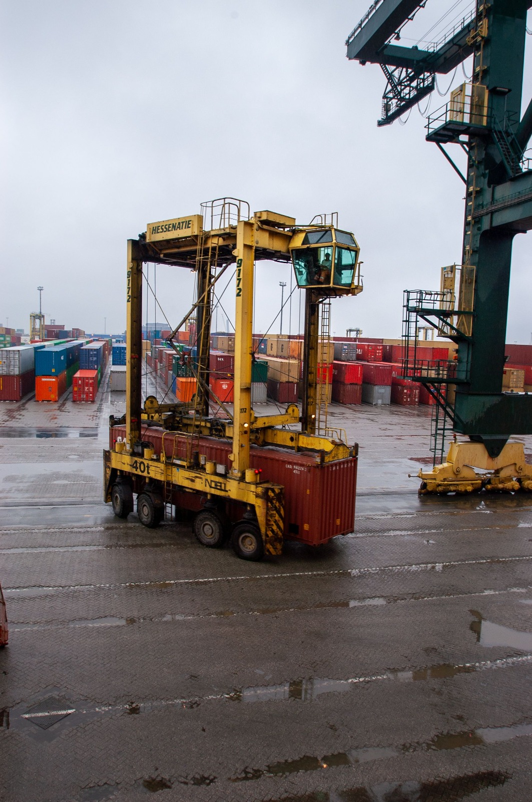 Electric stacker in use at a warehouse facility showing stackers in Umm Al Quwain for material handling operations.
