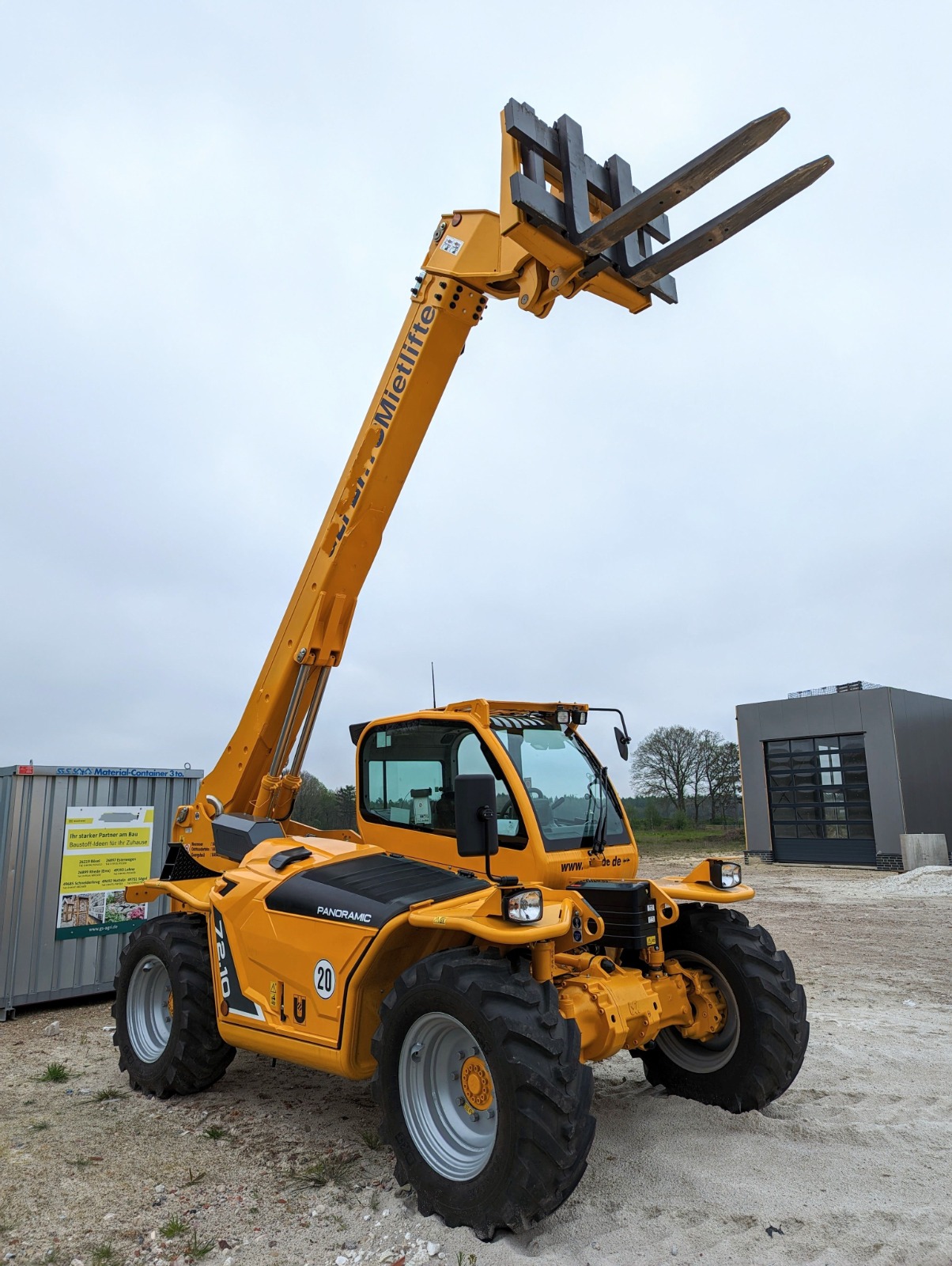Crawler excavators in Ajman lined up at Zoomlift's yard, ready for sale and rental delivery.