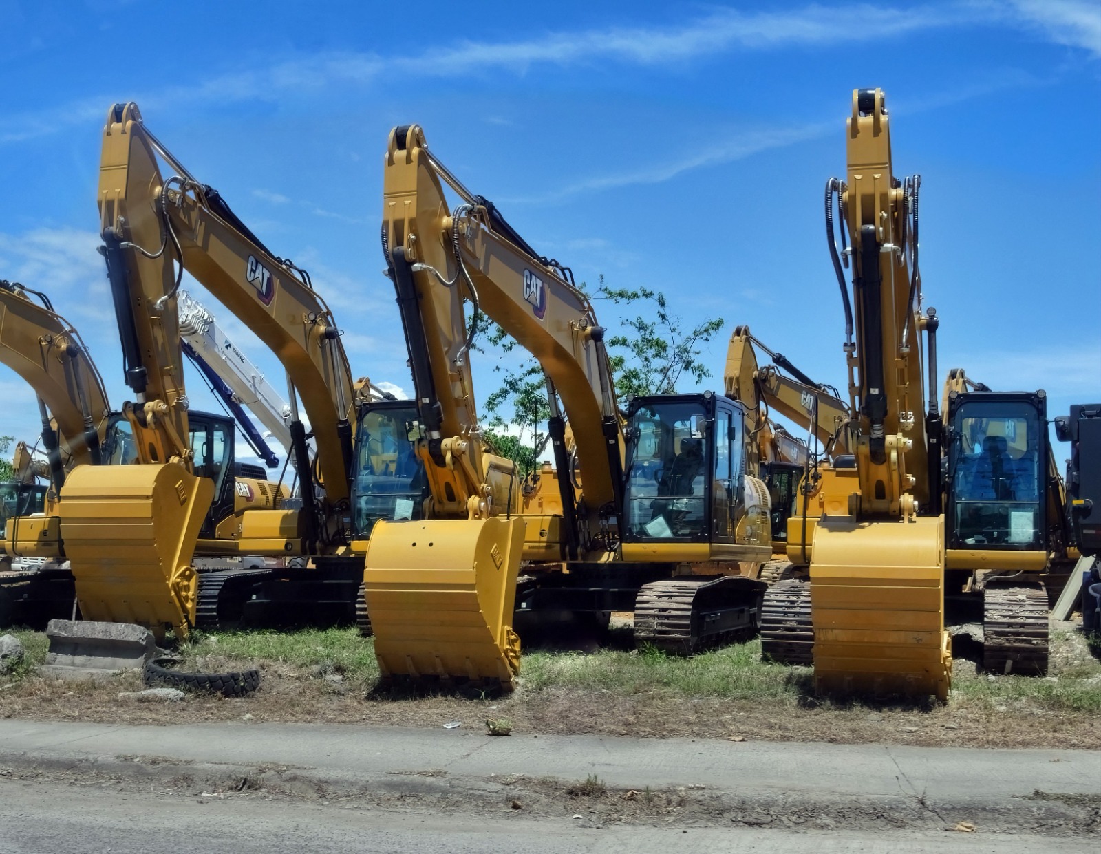 Crawler excavators in Dubai working on a construction site with tracked undercarriage visible