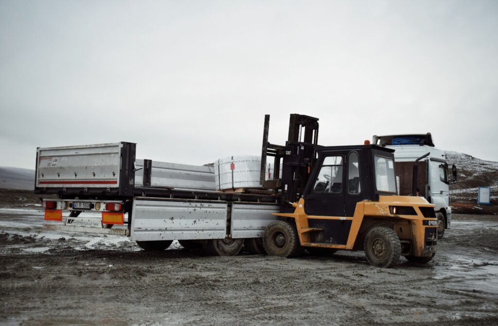 Electric forklift UAQ model operating indoors at a cold storage facility in Umm Al Quwain, UAE