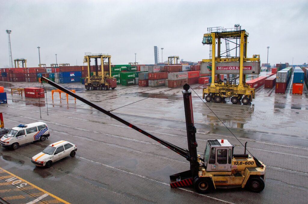 Full Electric Stacker Walkie operating in a Dubai, UAE warehouse for pallet lifting and transport tasks